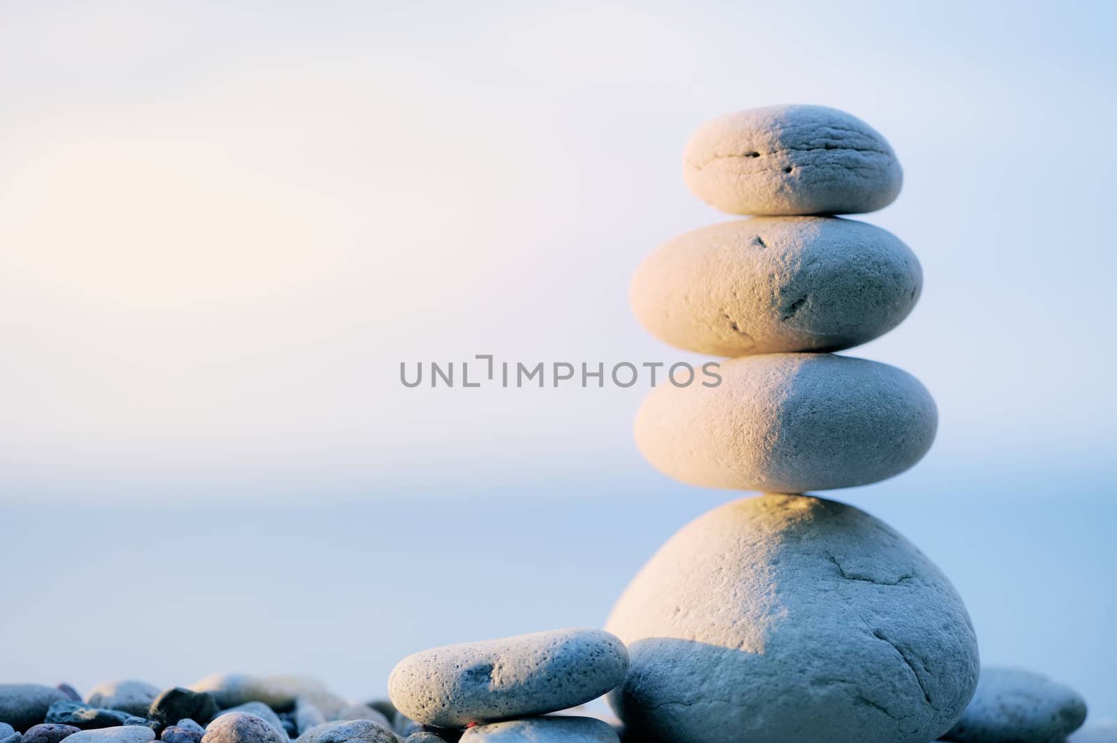 Pebbles in balancing on the sea coast