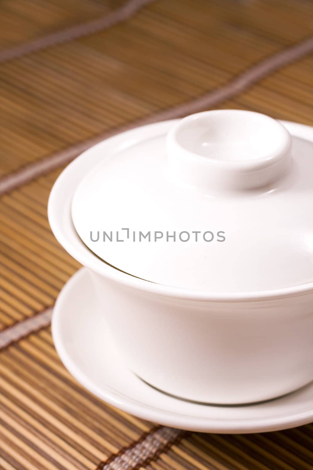 white teacup on wooden table for texture