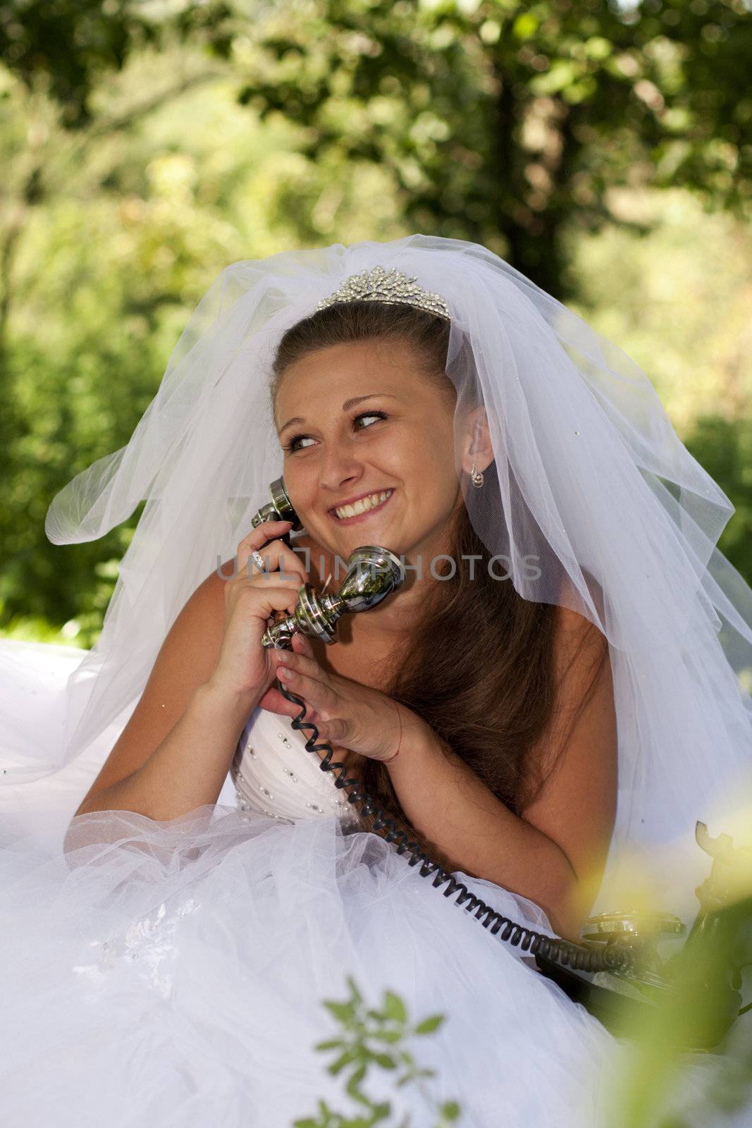 Bride of the telephone in an outdoor