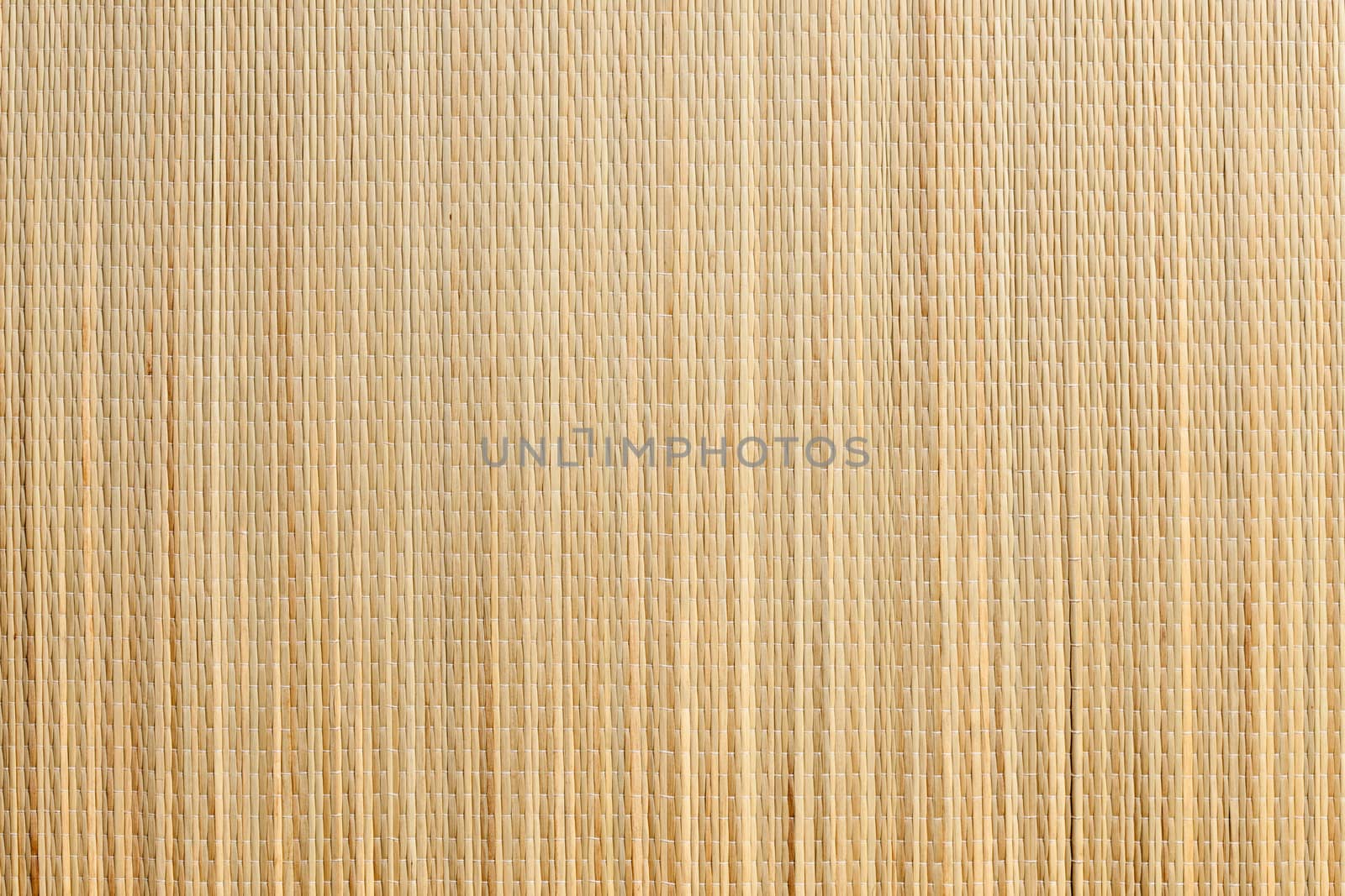 Uniform Tan Bamboo Mat Background Overhead Image.
