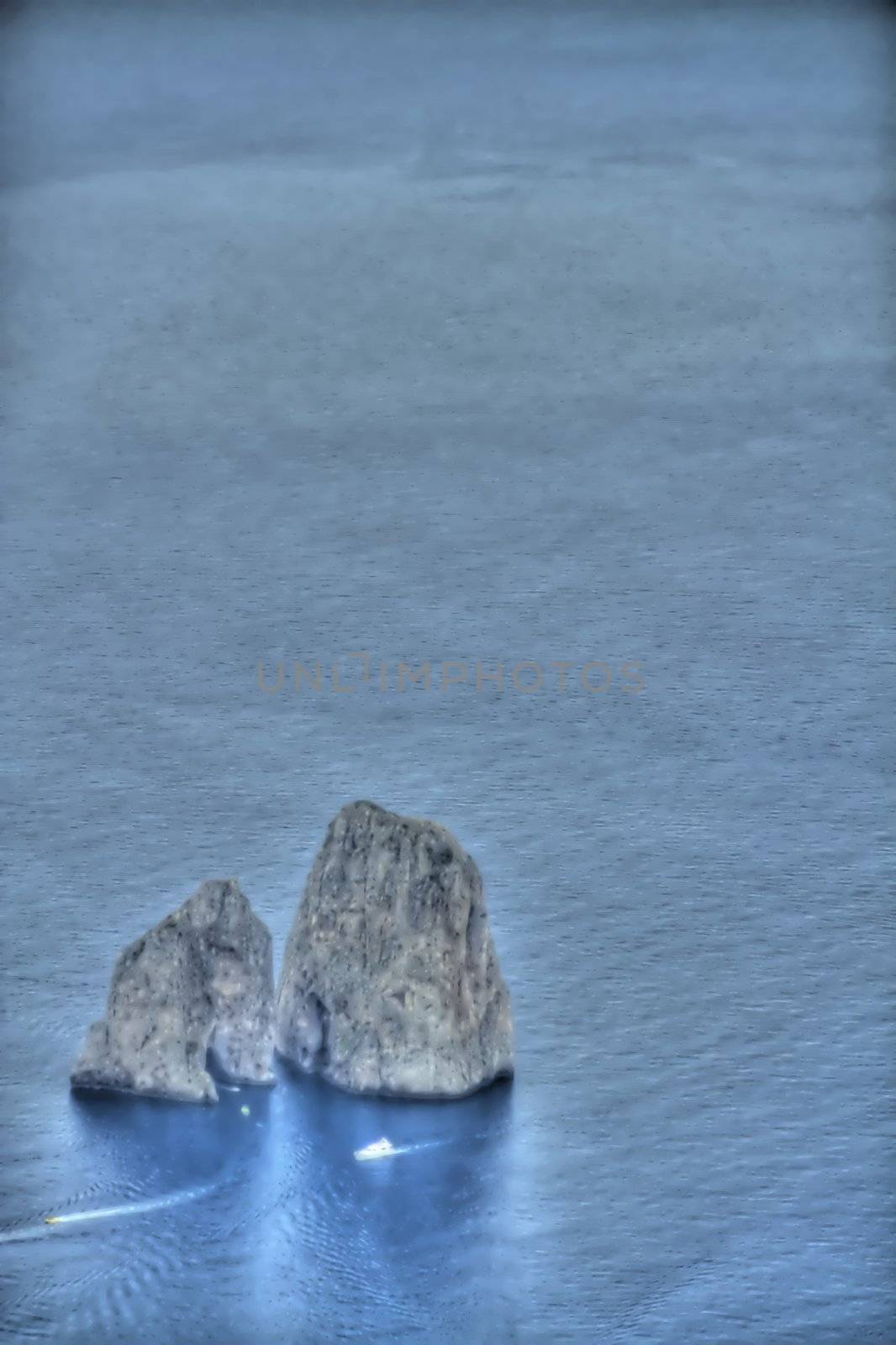 Rocks Rising from the blue waters of the Mediterranean sea.