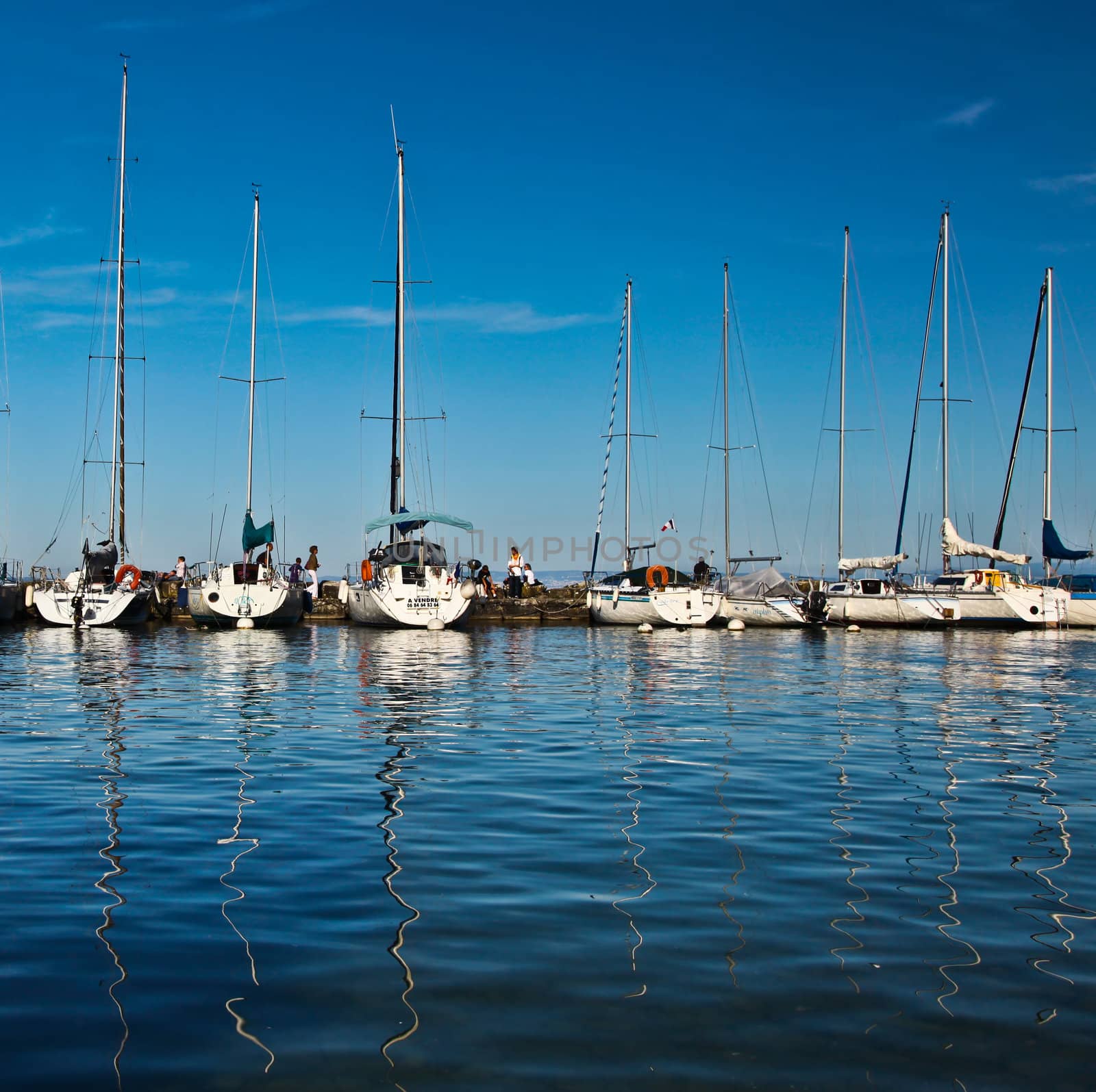Sailboats at a marina in Yvoire, France