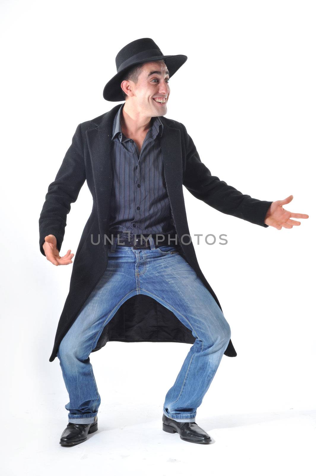 smiling young man with and black hat