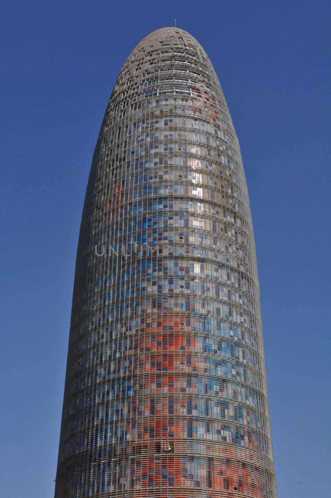 BARCELONA, SPAIN - JULY 26: Torre Agbar near Pla�a de les Gl�ries Catalanes on July 26, 2010 in Barcelona, Spain. marks the gateway to the new technological district of Catalonia, Spain