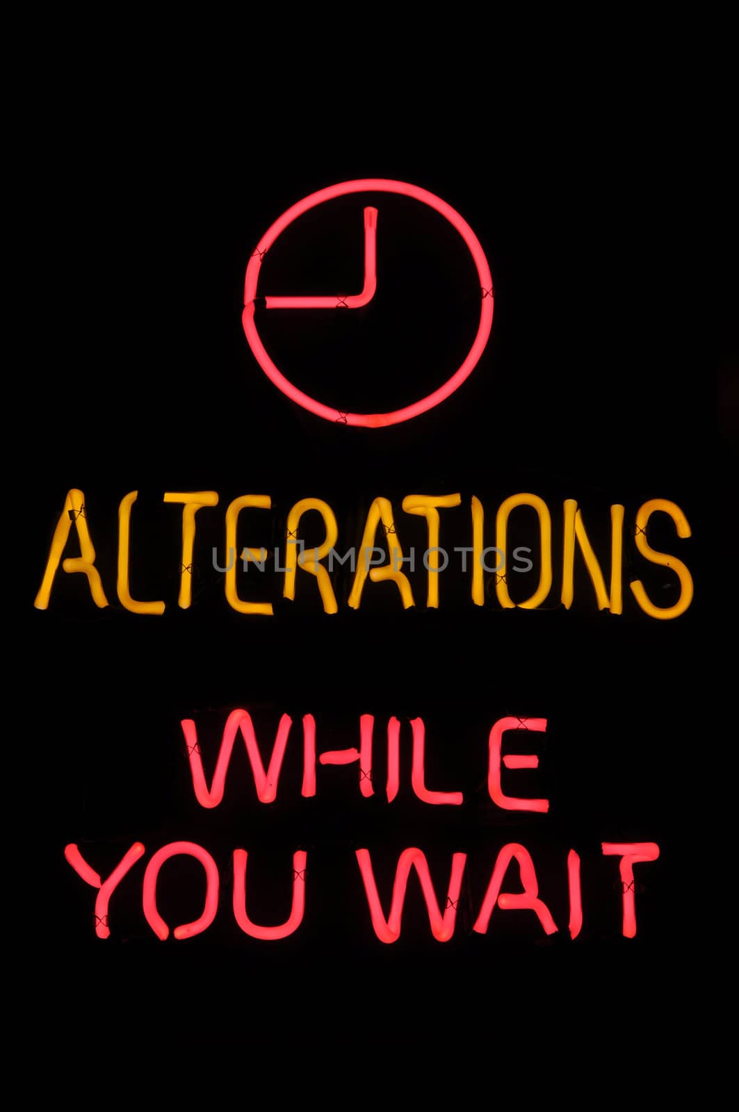 Alterations While You Wait Pink Neon Sign