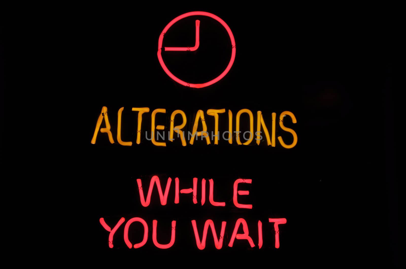 Alterations While You Wait Pink Neon Sign