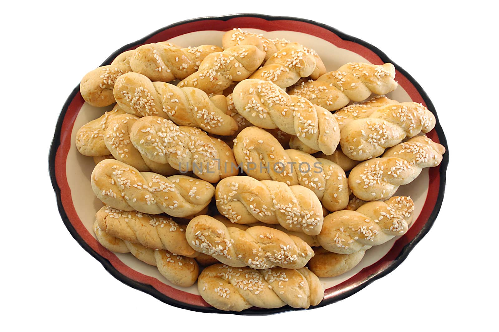 home made traditional Greek cookies in plate isolated over white