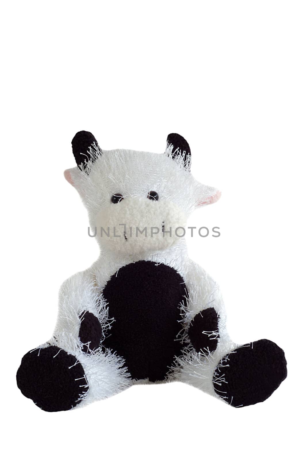stuffed toy cow isolated on white
