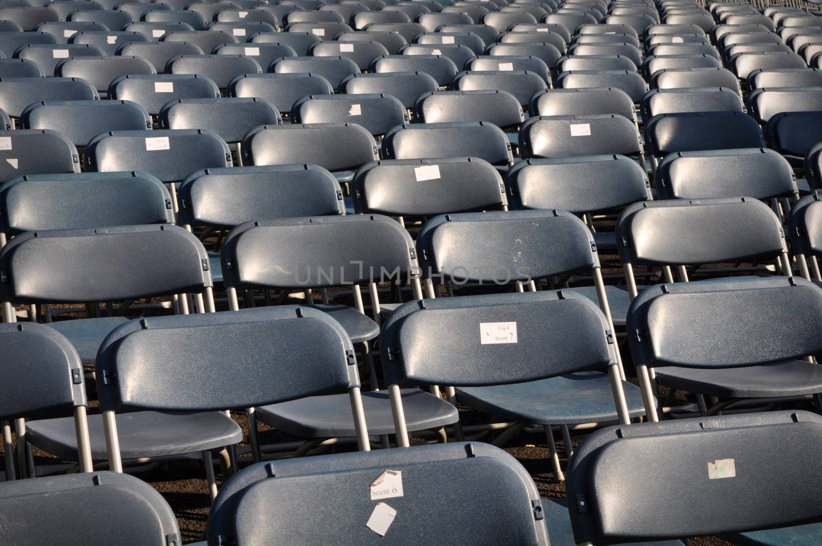 Black Chairs in Stadium for Concert or Sports Game Match