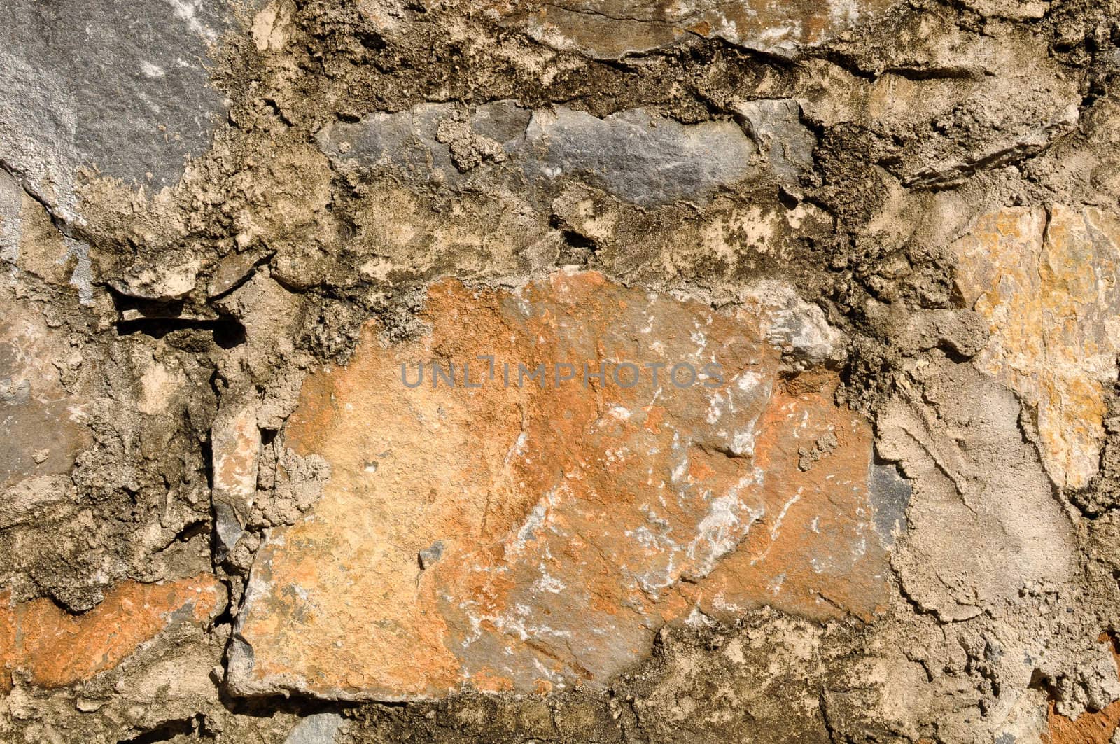 Colorful Stones set in Clay used as a background