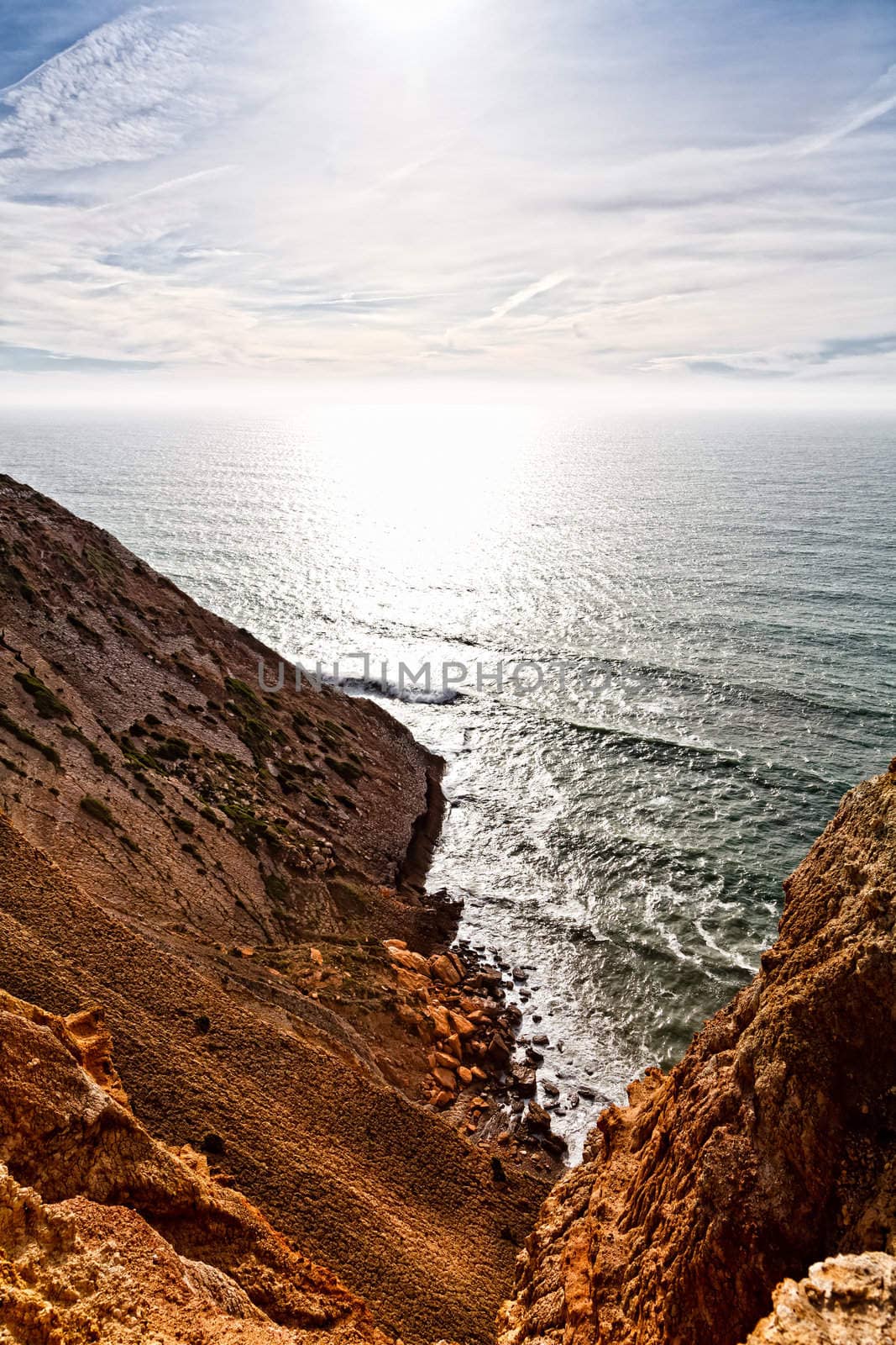 Beautiful cliff over the Atlantic Ocean in region of Sesimbra.