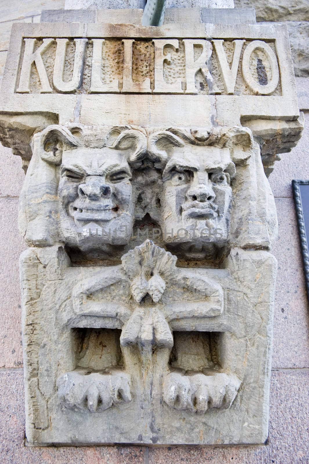 Characters from the Finnish national epos on a building facade in Helsinki.