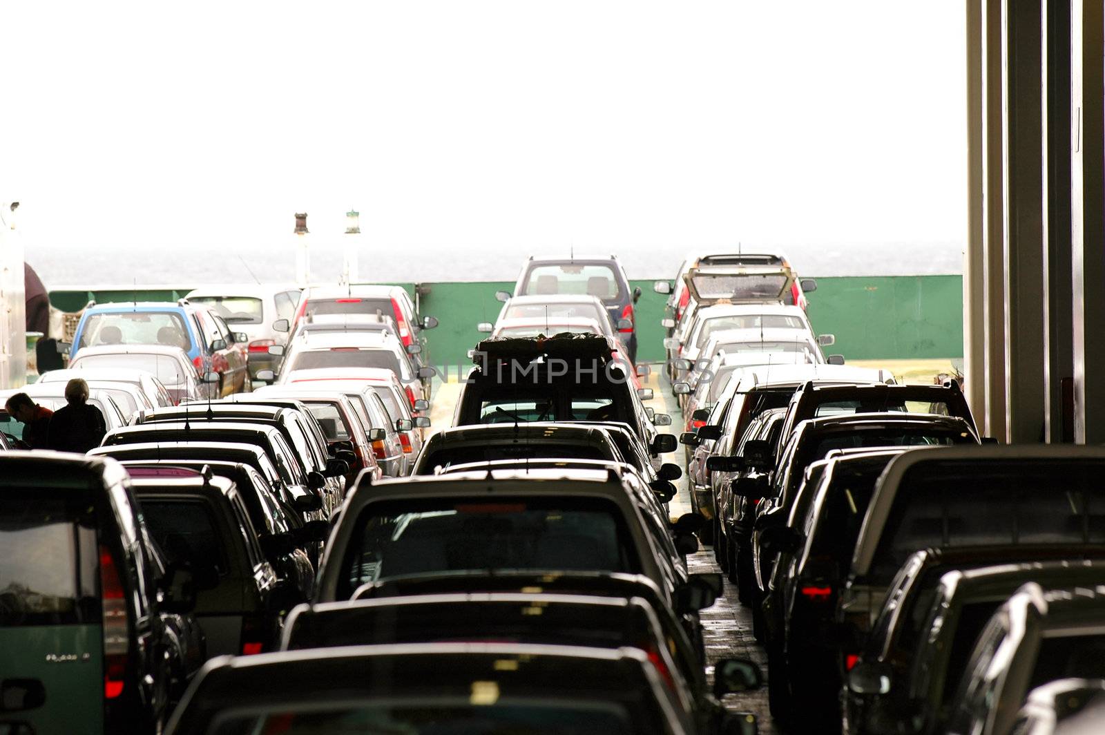 Cars are parked on a ferry