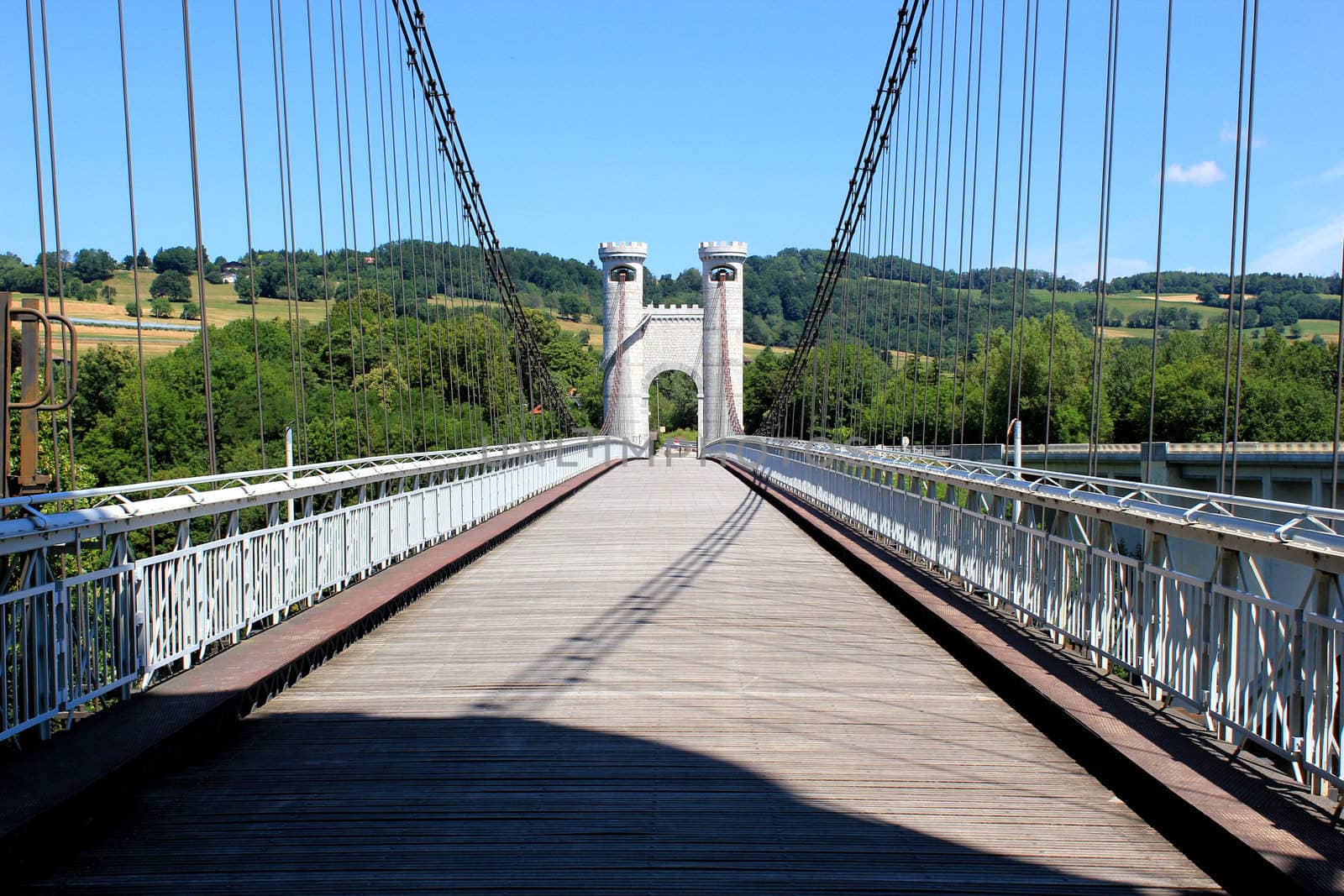 Suspended old bridge of the Caille, France, with its two towers
