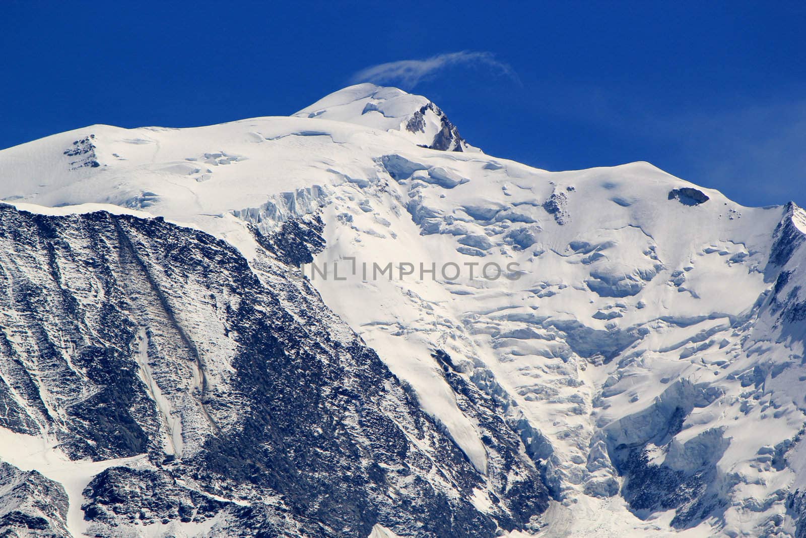 Snowy peak in the Mont-Blanc massif mountain by beautiful weather, France