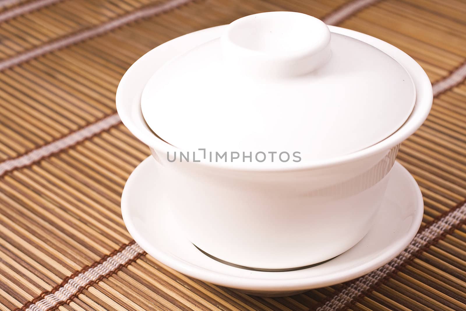 white teacup on wooden table for texture
