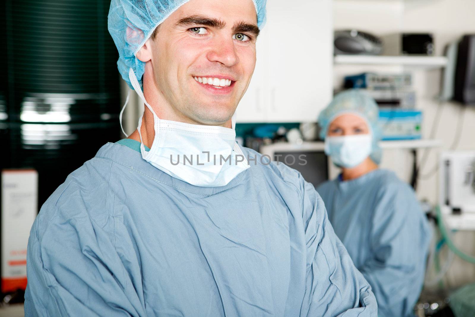 A portrait of a surgeon in a small operating room