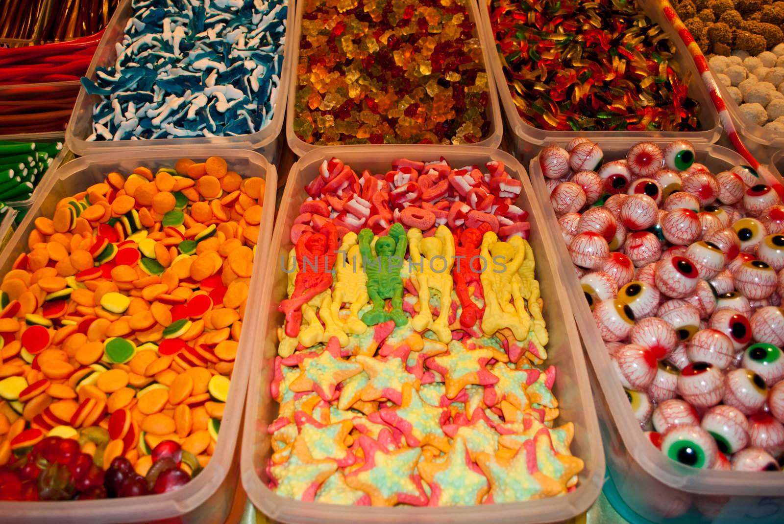 Assorted and colorful candies in a candy store.