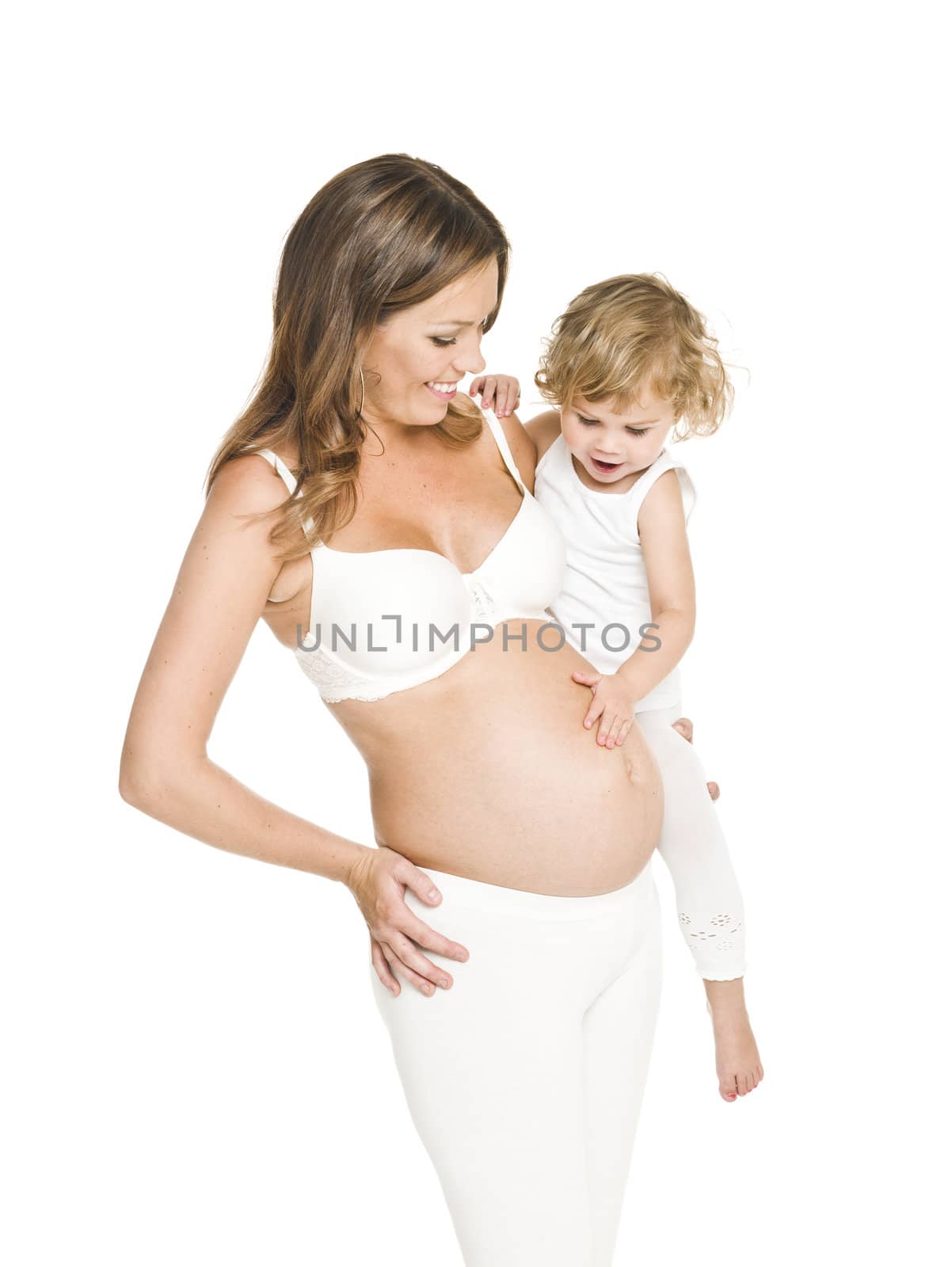 Pregnant woman with her daughter isolated on white background