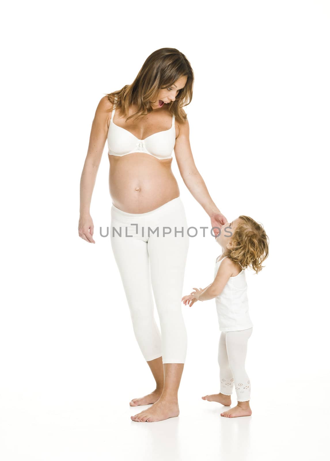 Pregnant woman with her daughter by gemenacom