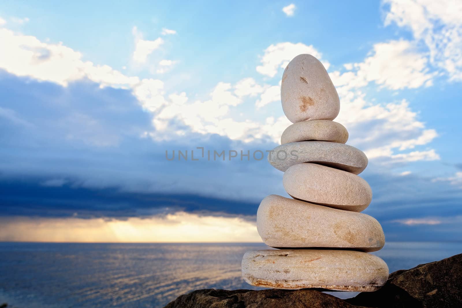 White pebbles on the sea coast in the evening