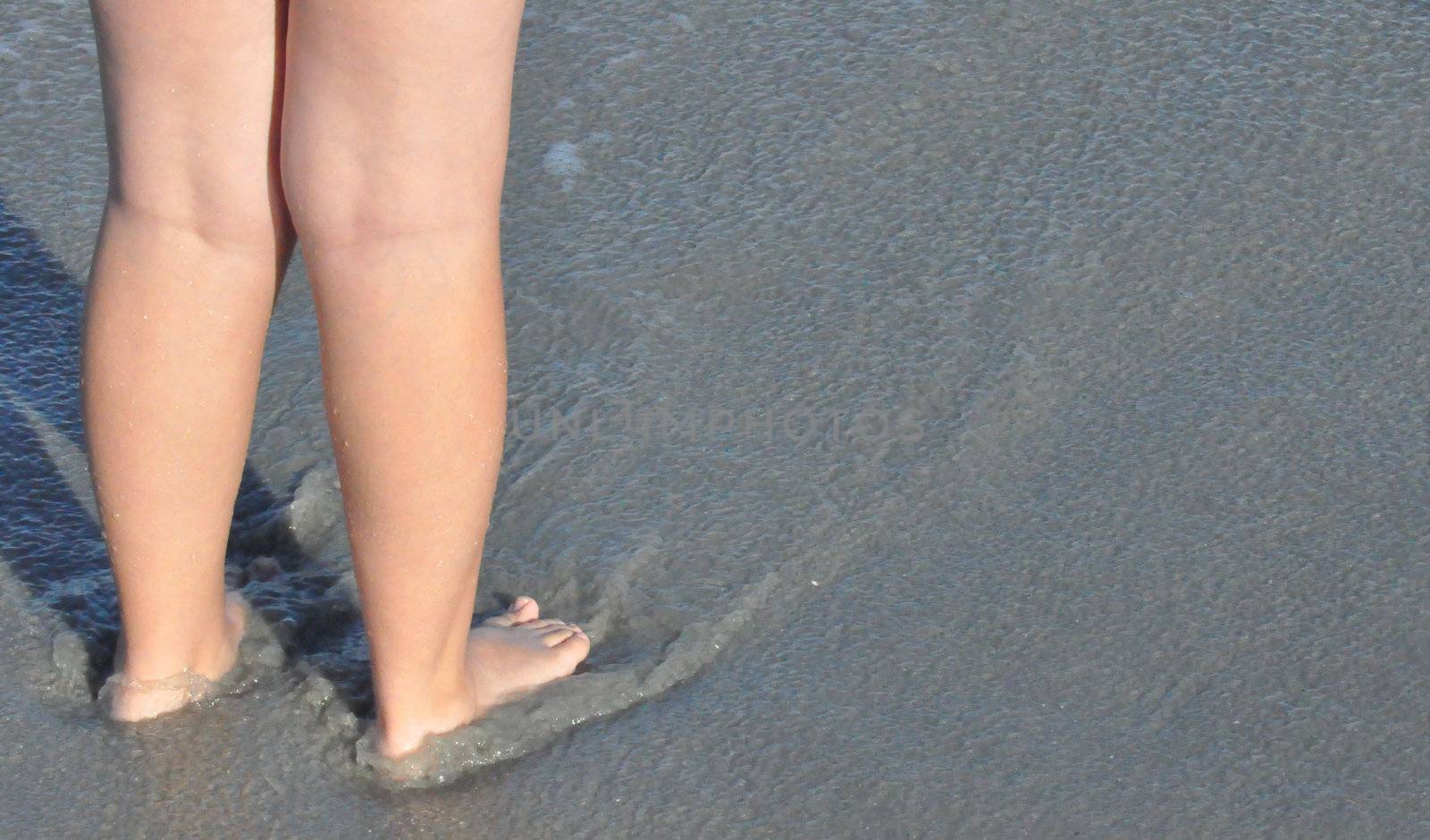 Feet in the sand