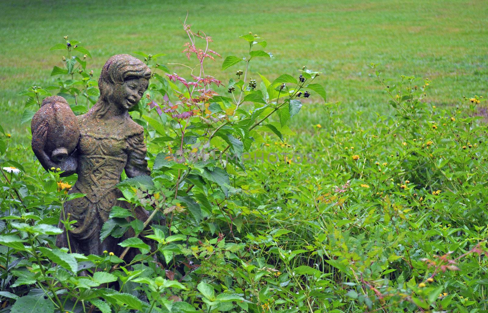 Girl statue in garden - background 2