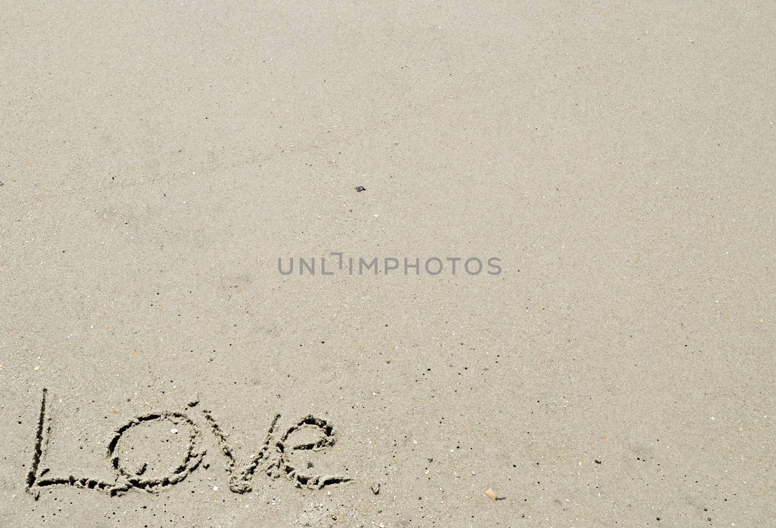 Love written in the sand - bottom left corner by RefocusPhoto