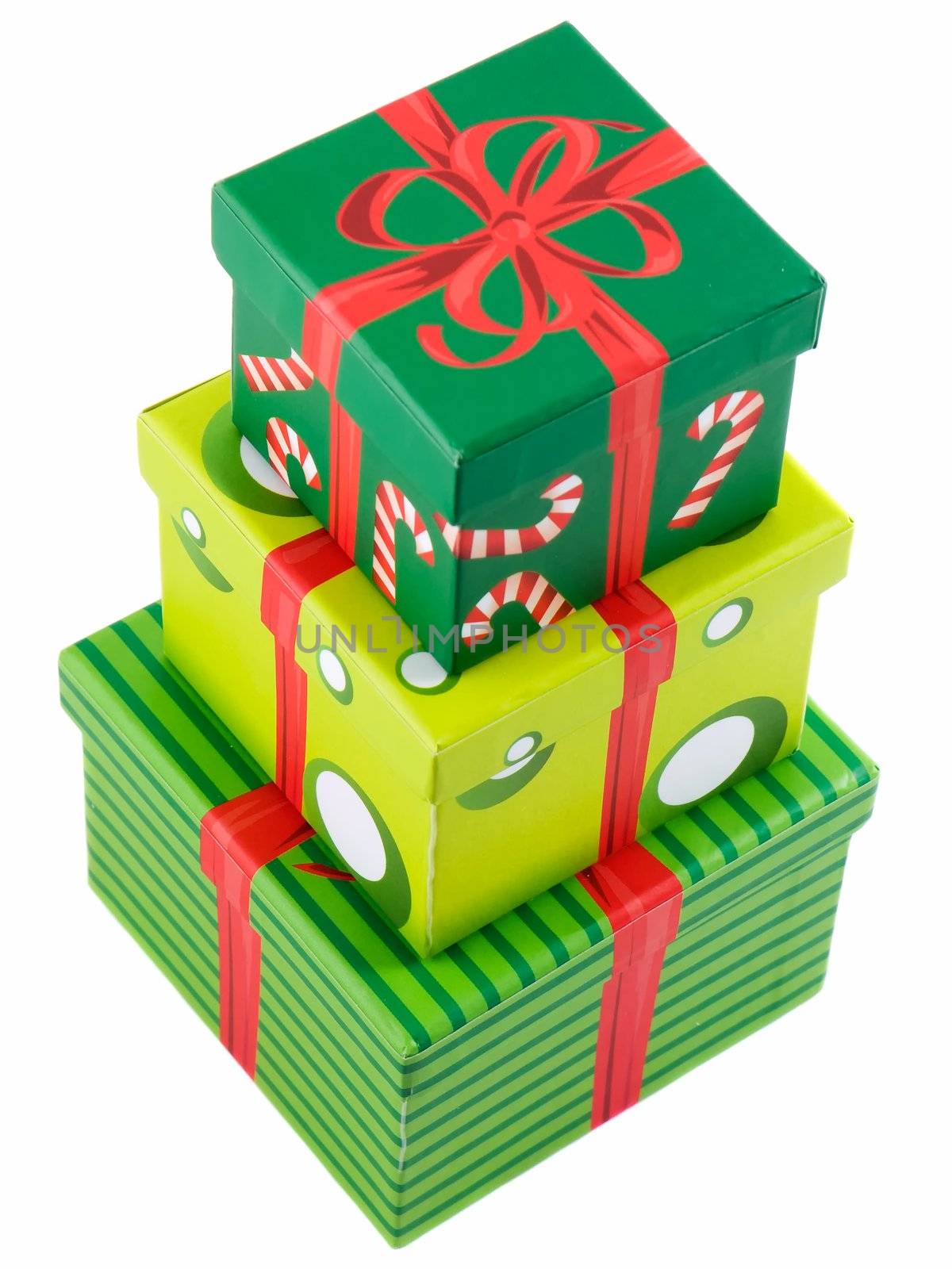 Three christmas presents stacked and isolated on white