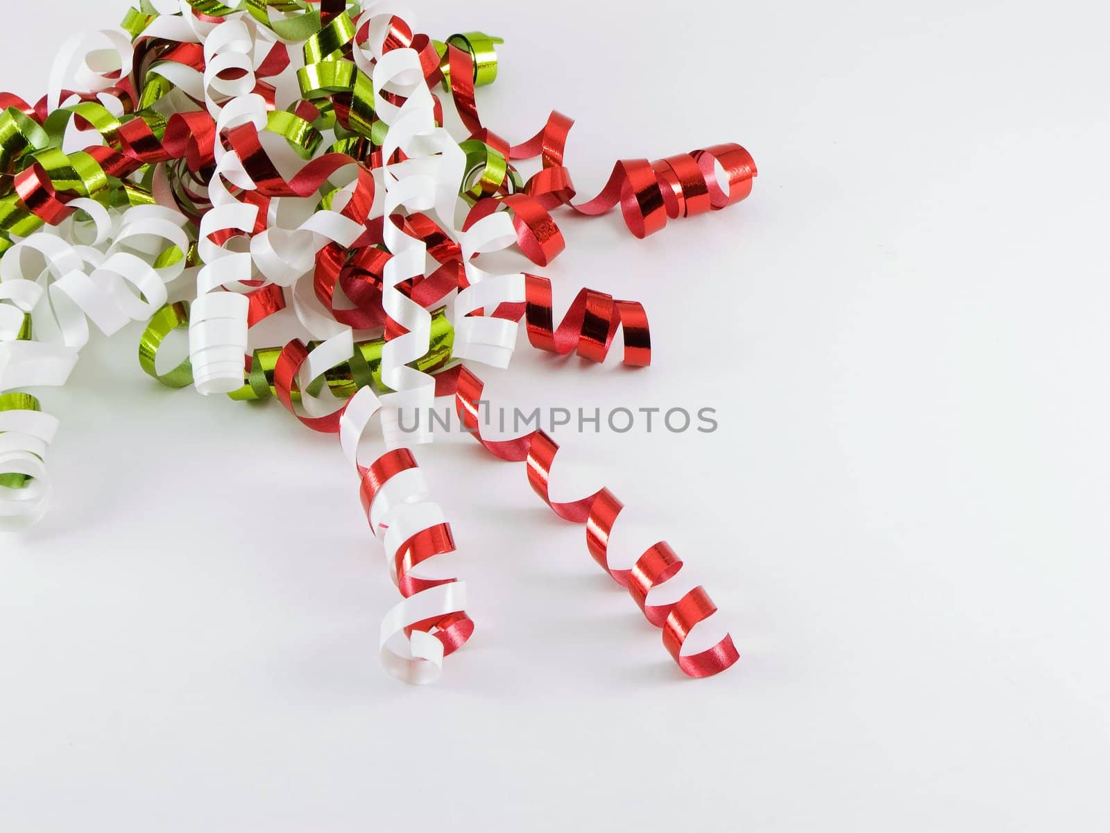 Curled red, green, and white ribbon for christmas