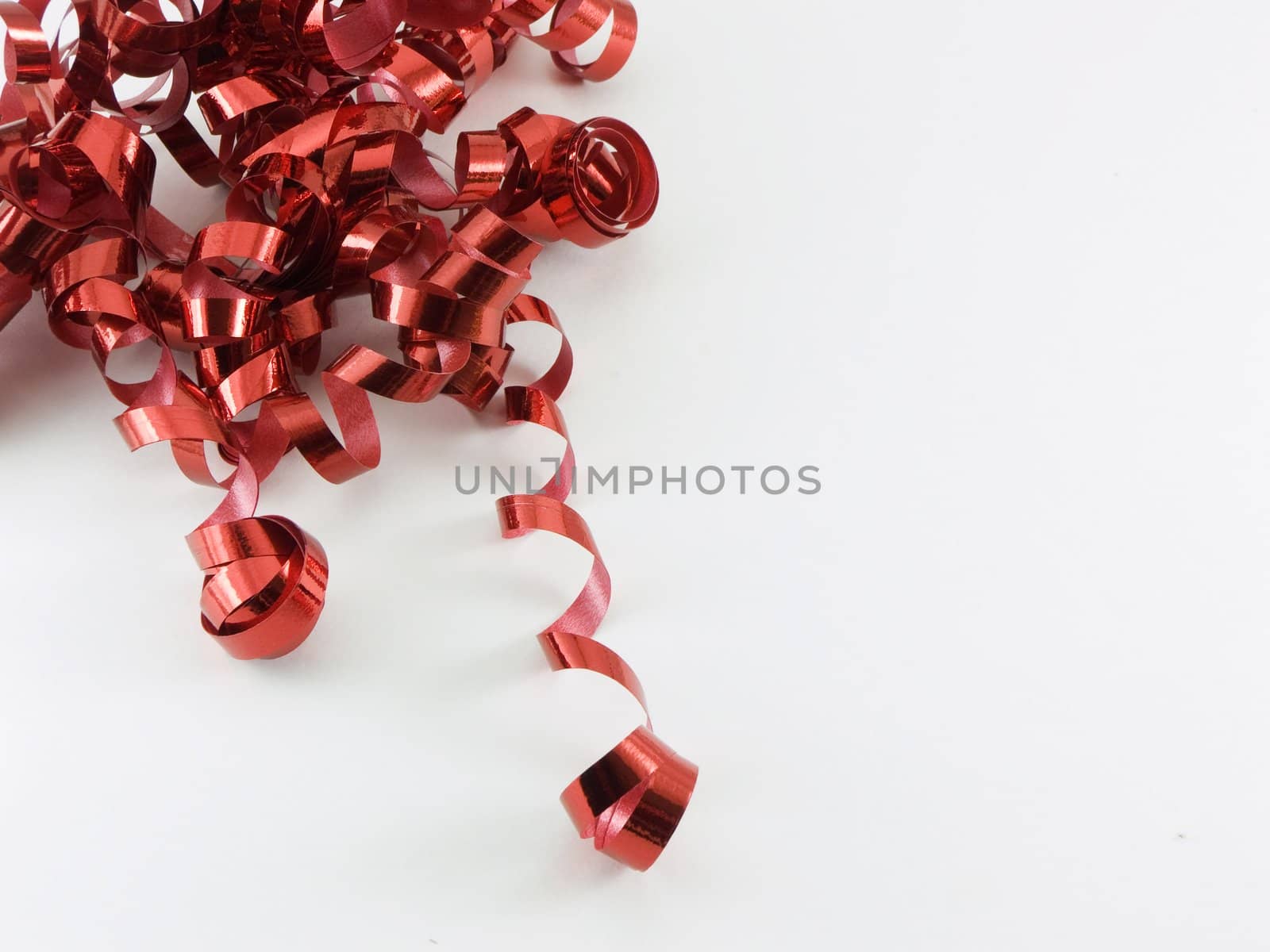 Curled red christmas ribbon