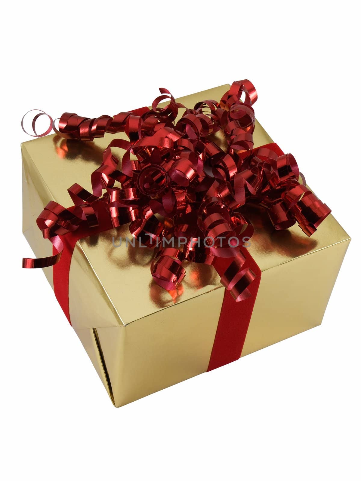 Christmas present wrapped with curly ribbon on top, isolated on white