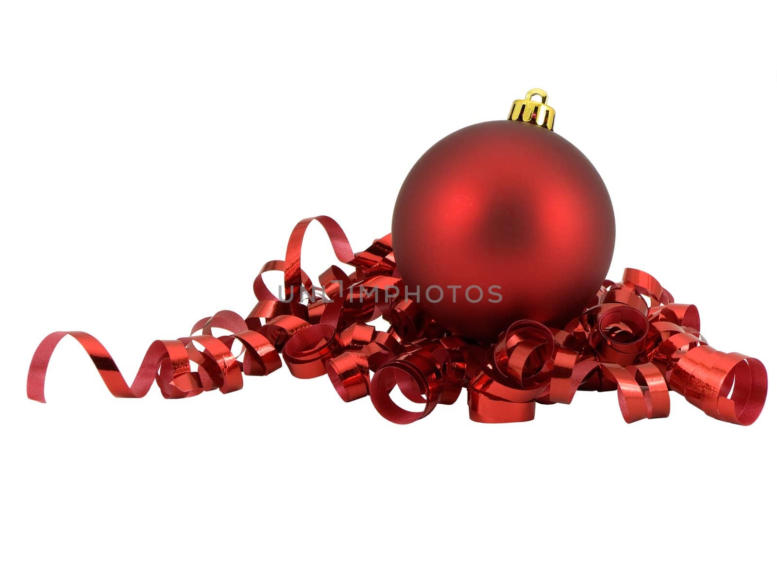 Christmas ornament on curled red ribbon, isolated on white