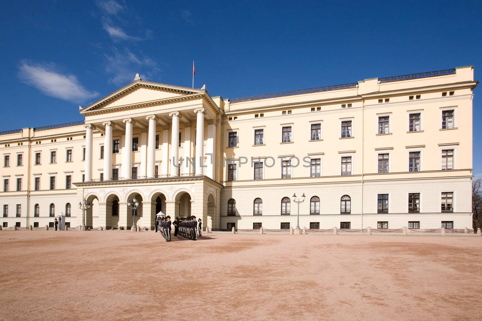 The Oslo Palace on a bright blue day waiting the arrival of a V.I.P.