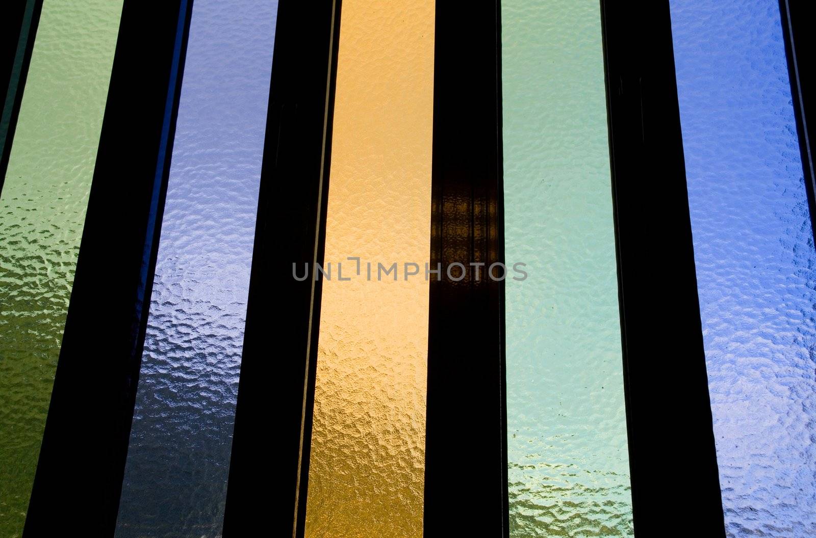 abstract colored and textured window glass detail