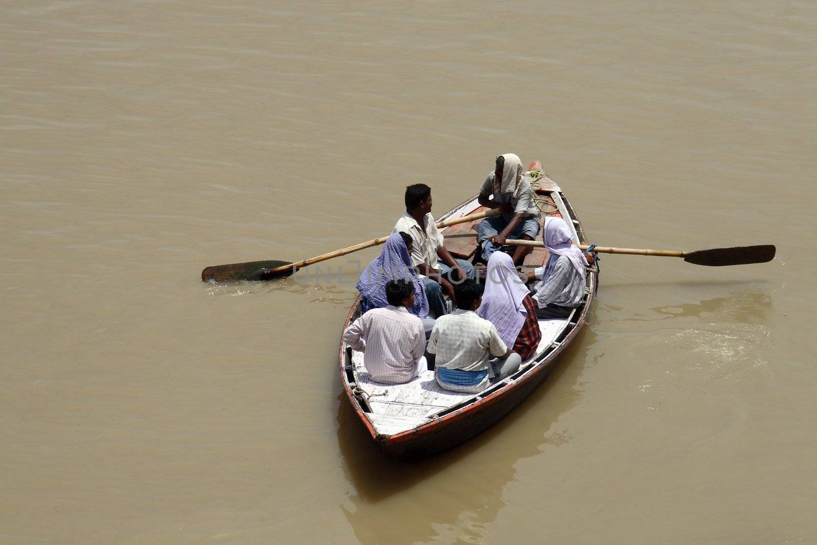 people in boat by zeber