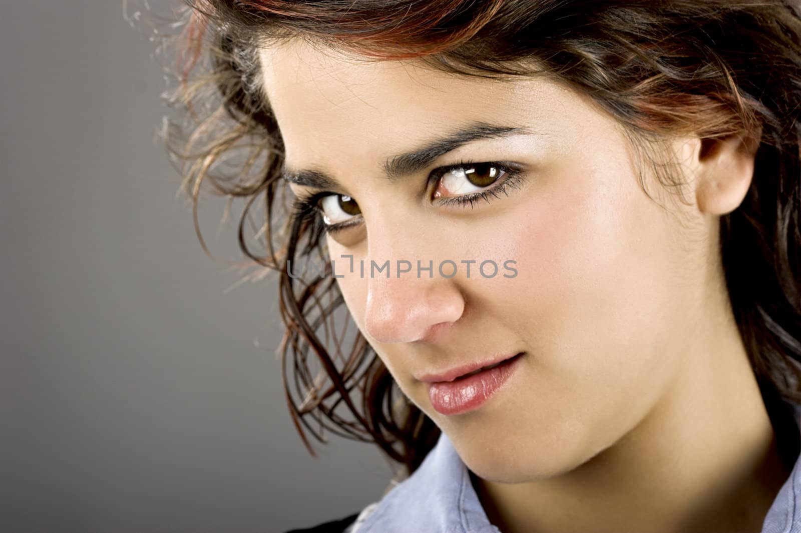 A close-up portrait  of a beautiful young and attractive woman