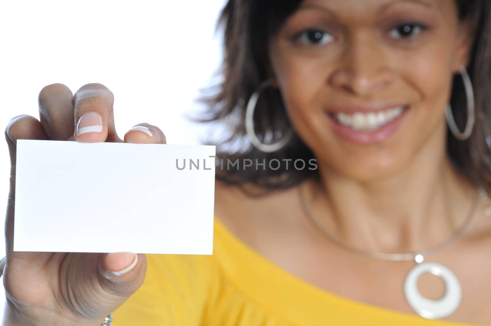  african-american woman holding a blank businesscard on a white background