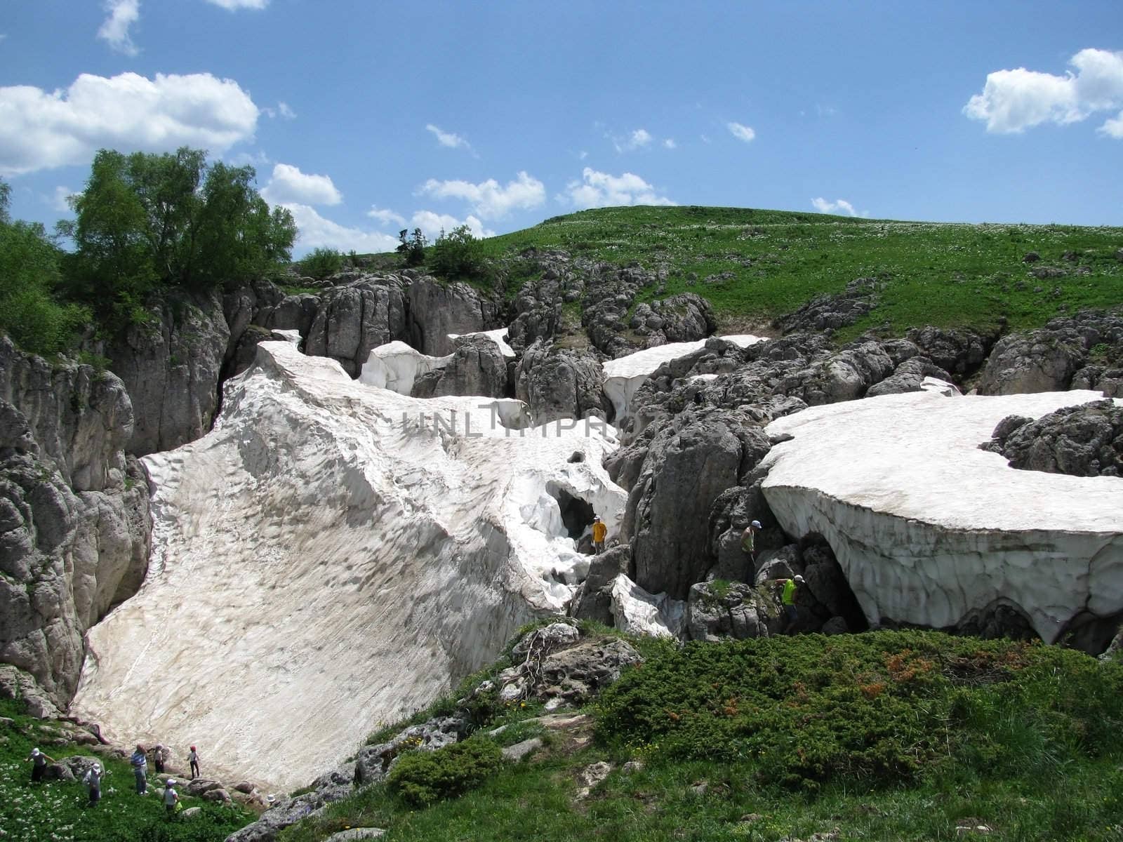 Rock, stone, block, rocky, the main Caucasian ridge; relief; a landscape; a hill; a panorama; mountains; Caucasus; a slope; a snow