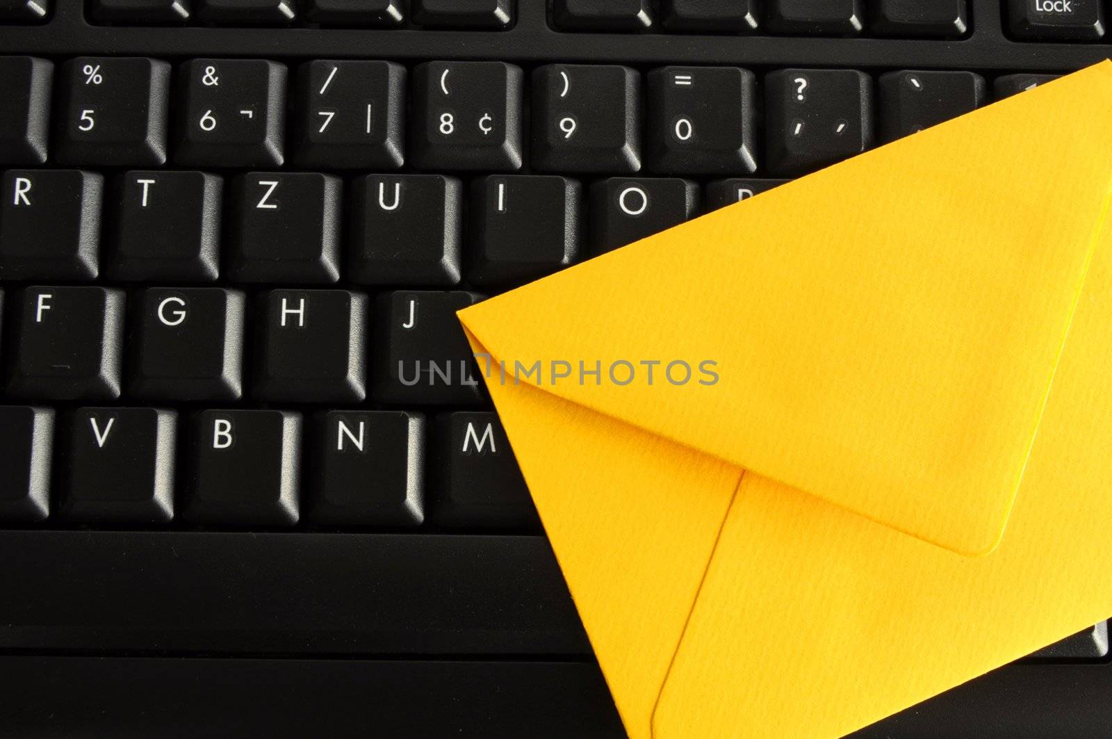 email concept with envelop and keyboard showing modern communication