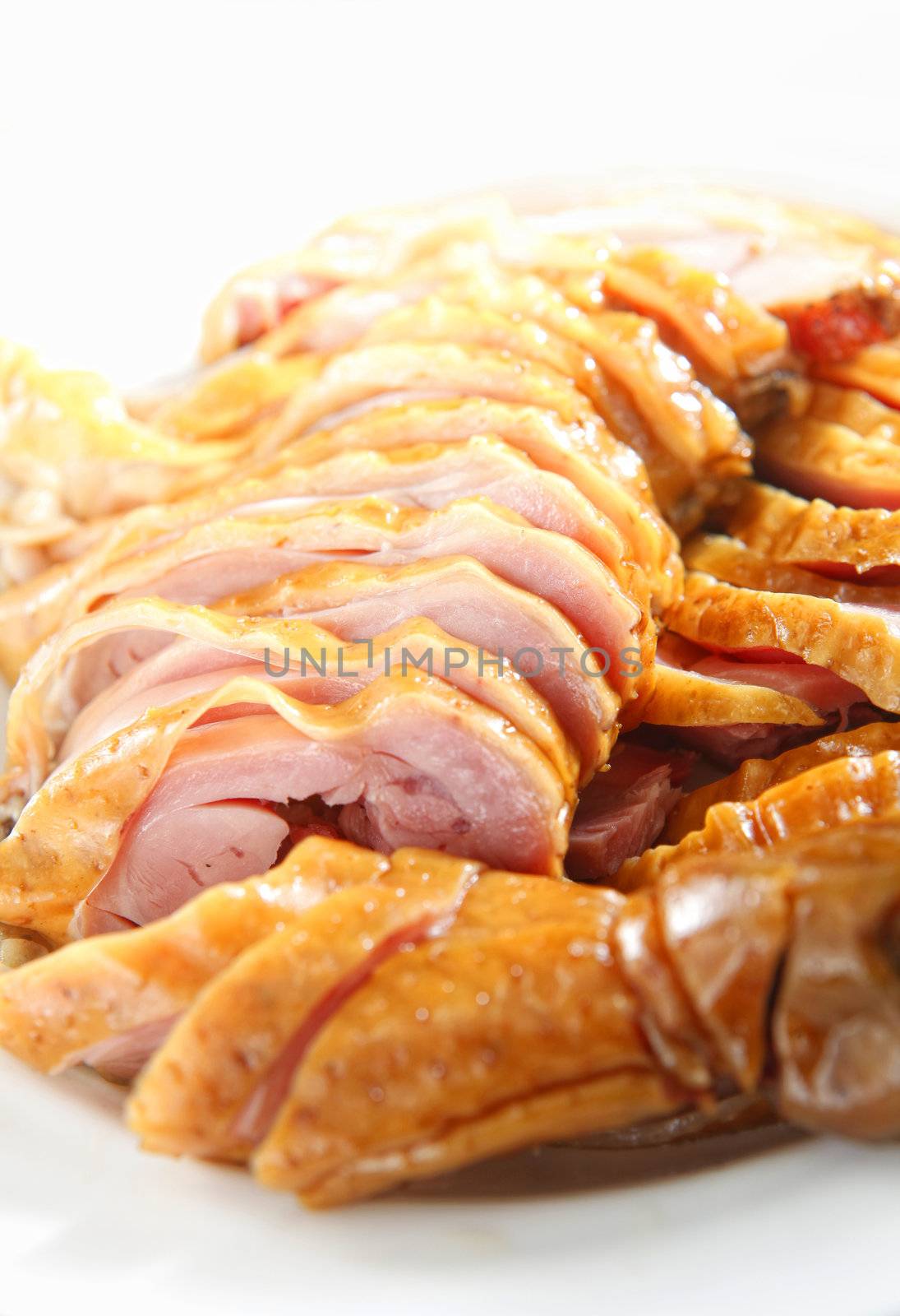 Sliced duck meat on the dish.
