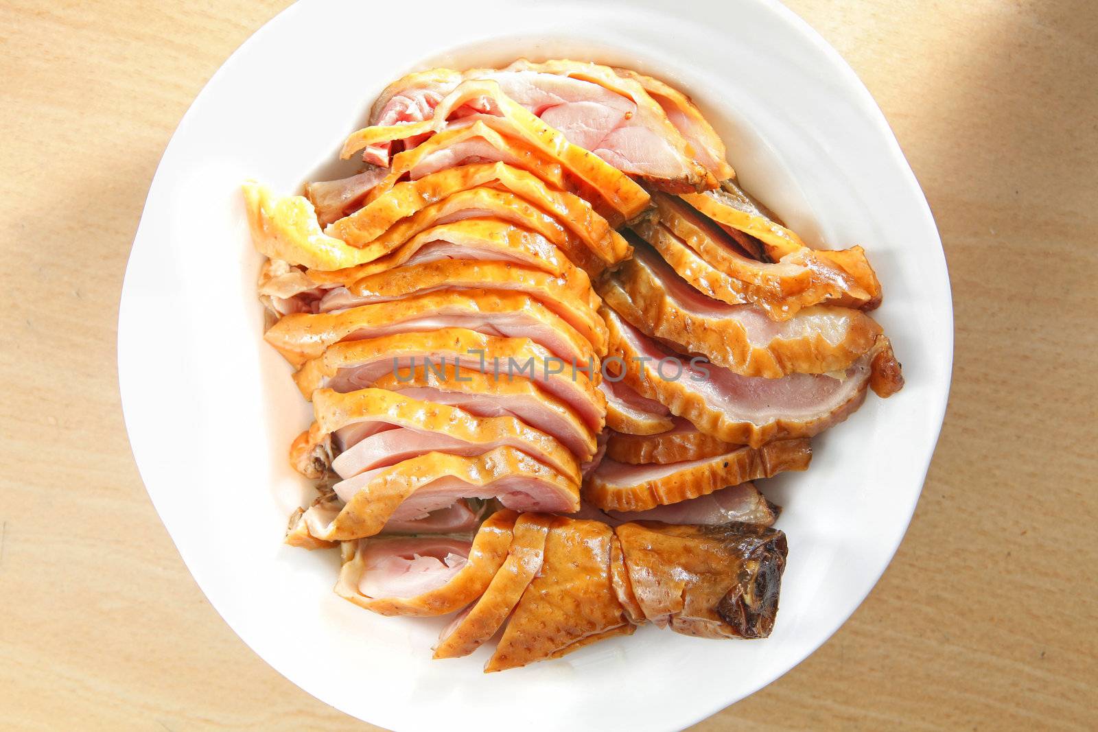 Sliced duck meat on the dish.