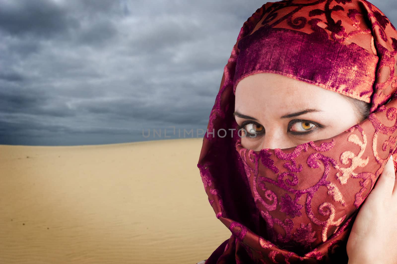 woman dressed in Arab costume, desert in the background by FernandoCortes