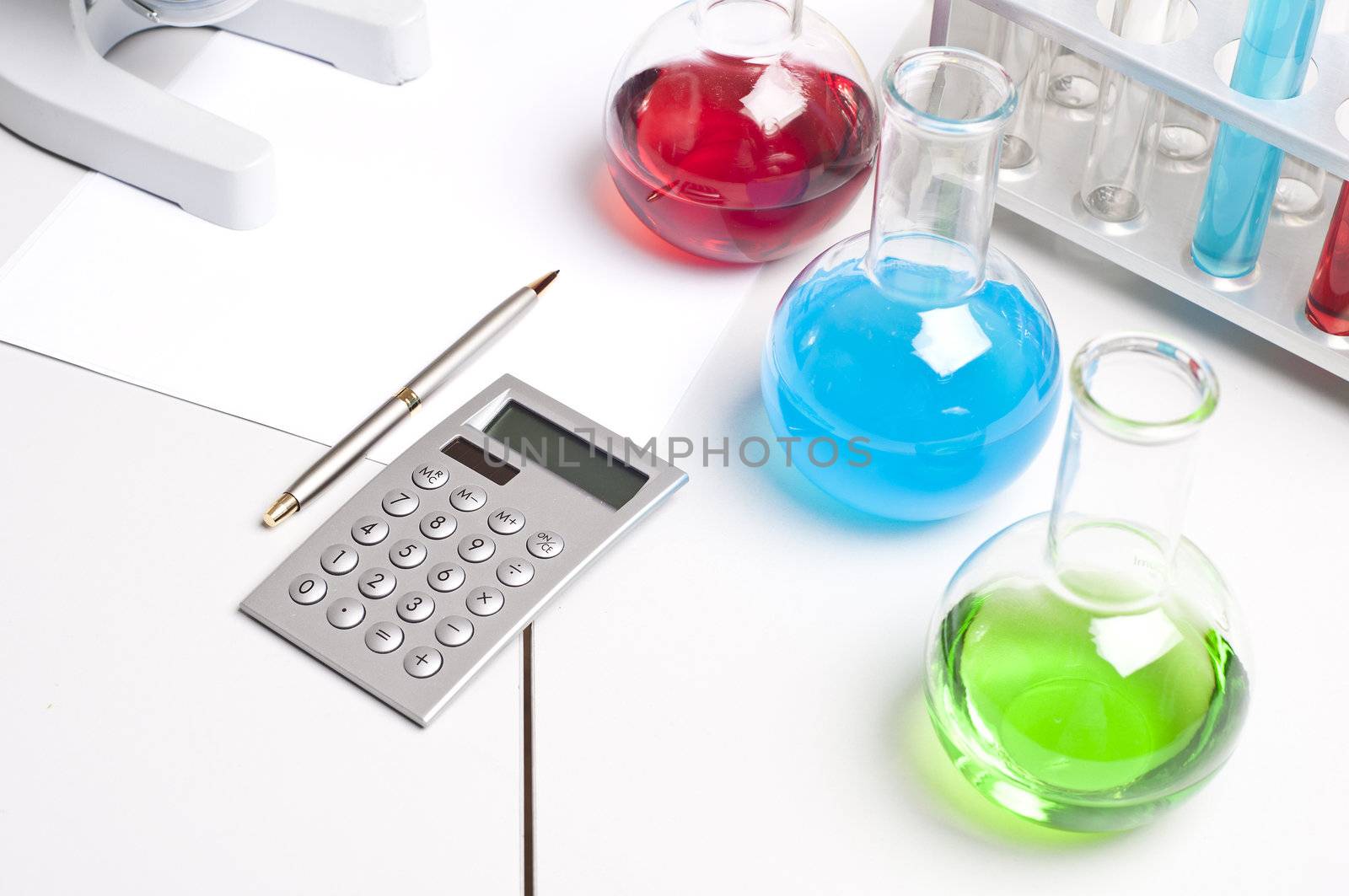 workplace employee lab,flasks with colored liquids, laboratory items