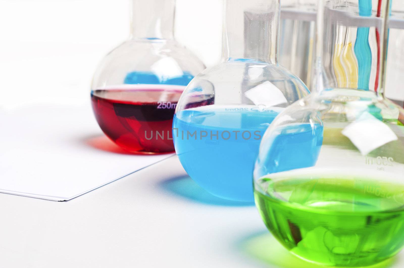 lab flasks with colored liquids,  lab workplace by adam121