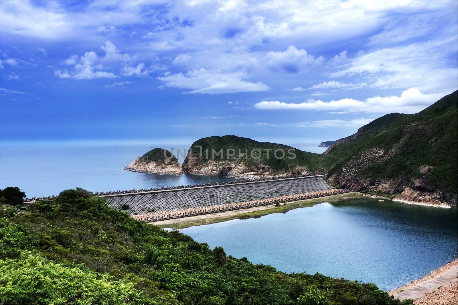 Blue sky and sea with mountains in hong kong