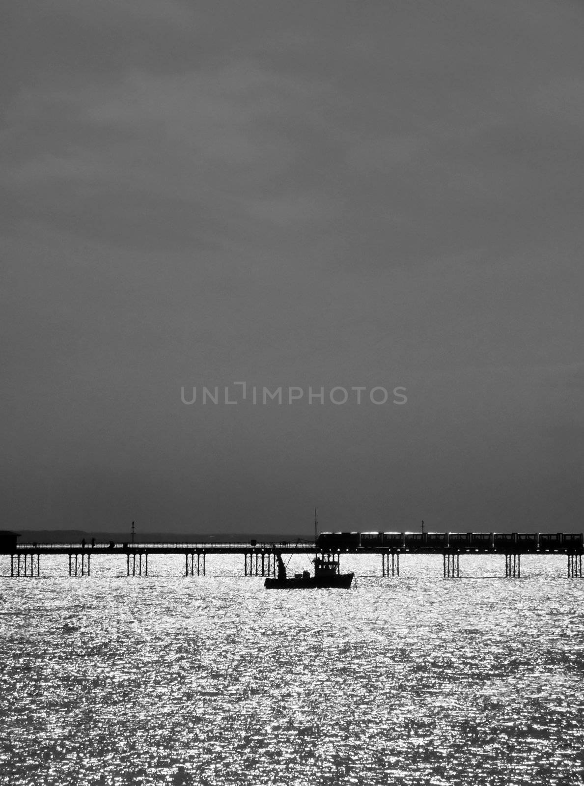 A boat that is by the pier in Southend.