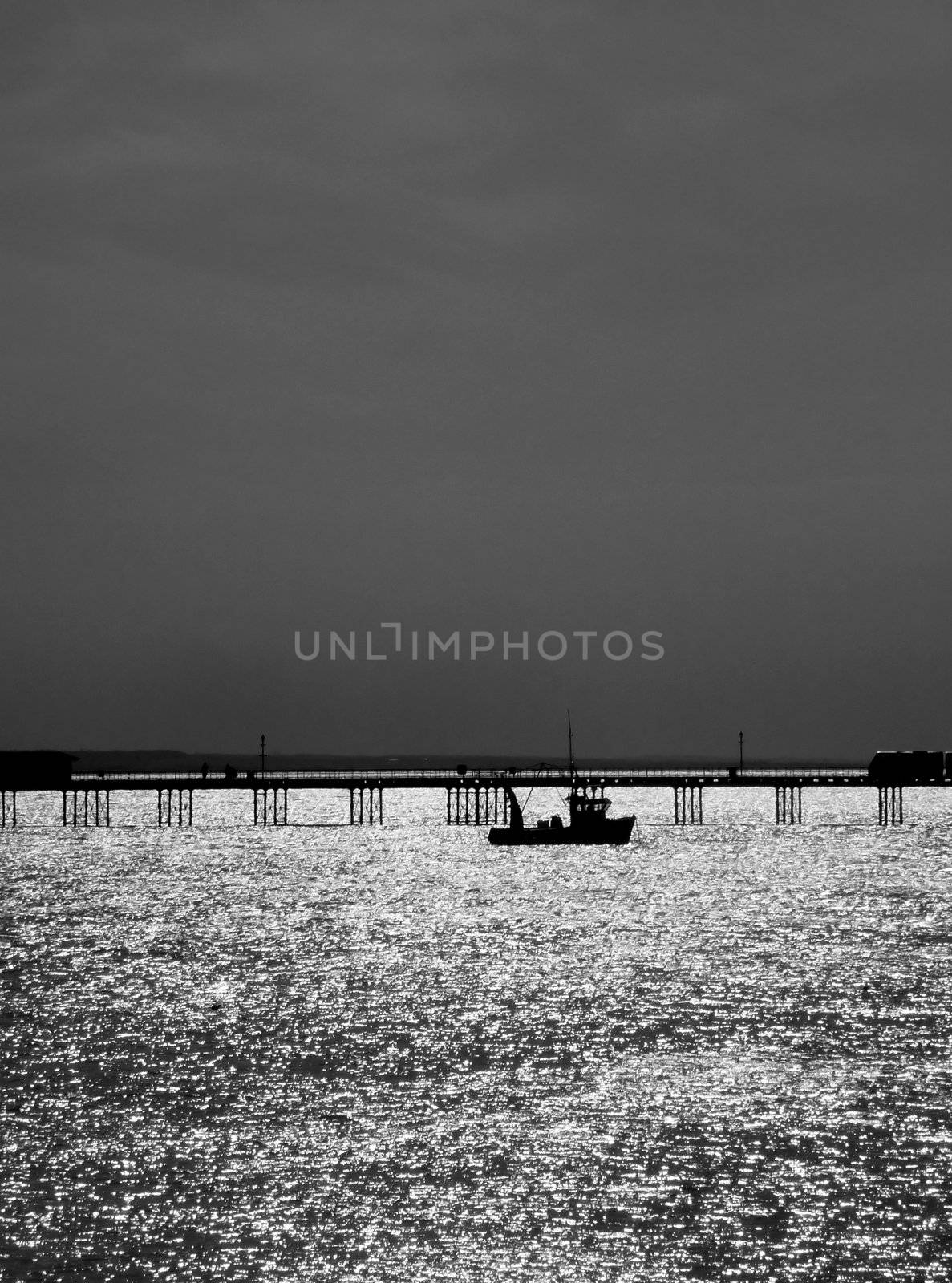 A boat that is by the pier in Southend.