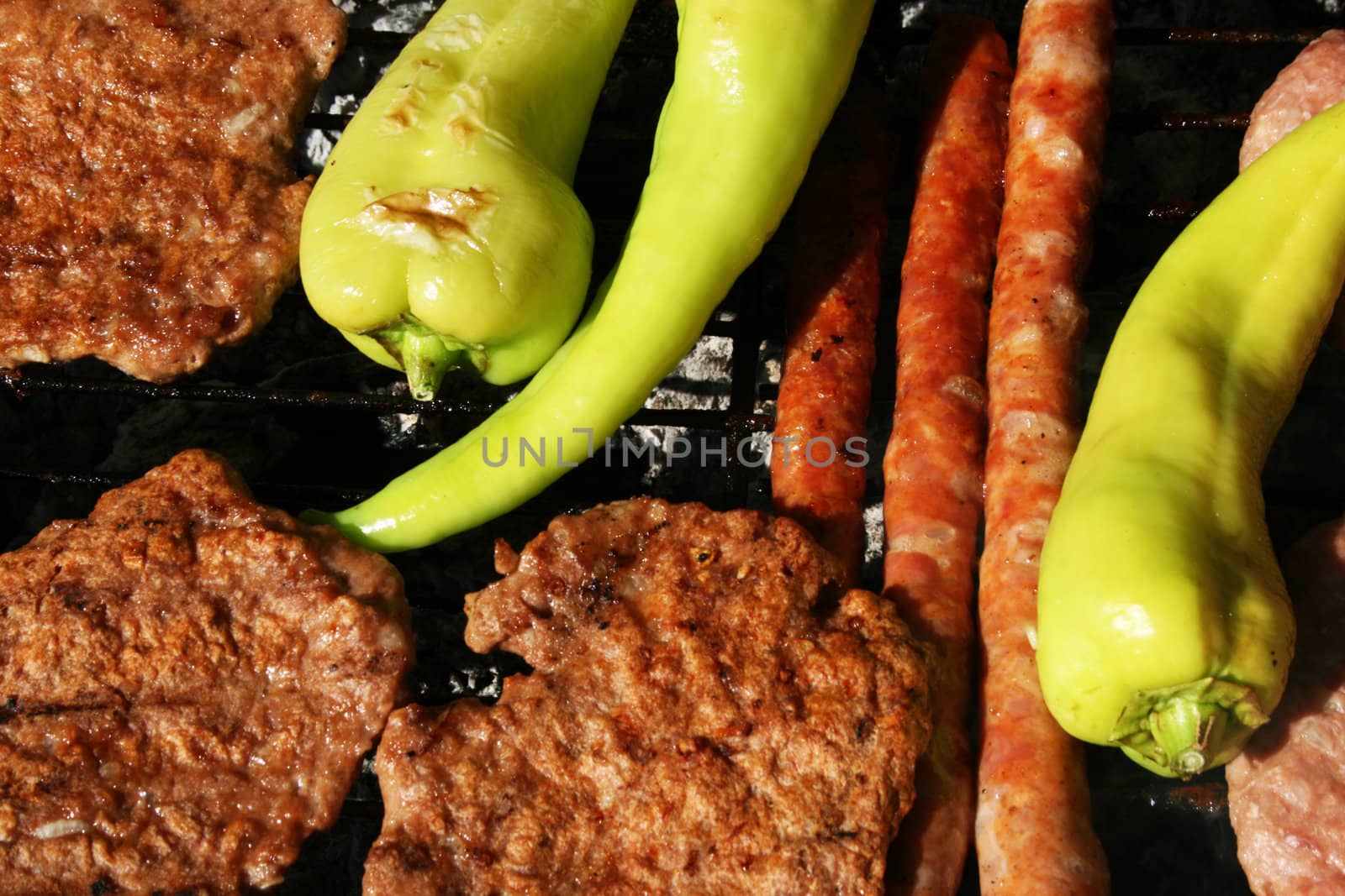 burgers and sausages at barbecue