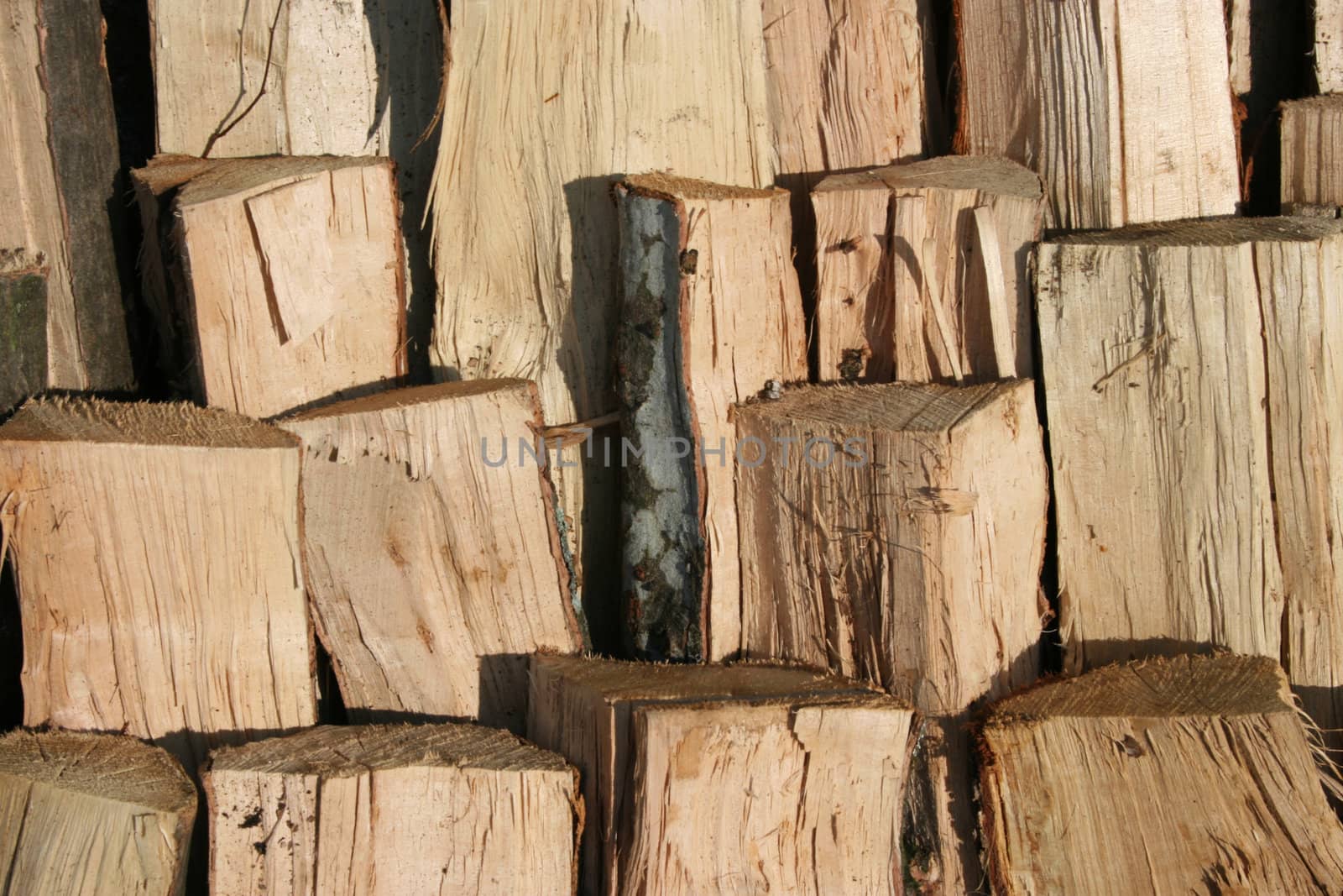 stack of raw wood fuel